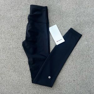 Women’s new with tags black Wunder Train athletic leggings
